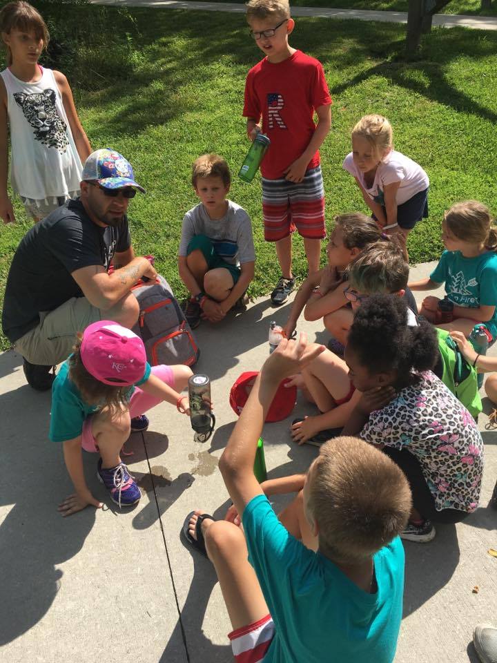  Adam Kisler leading kids in an activity at Camp Maple Woods summer day camp on July 13, 2017.