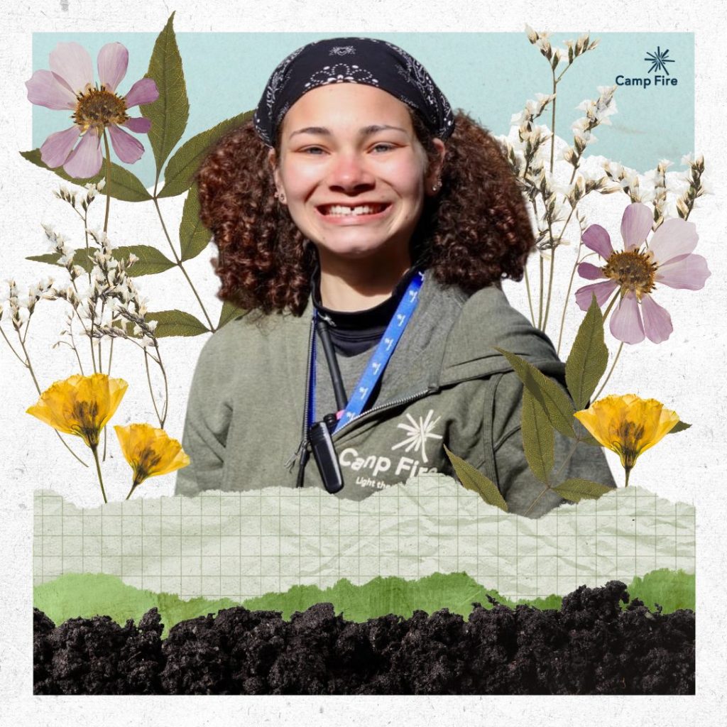 Girl smiling with background of flowers and texture paper.